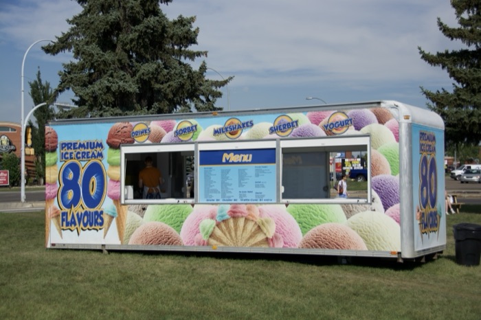 The first 80 Flavours trailer parked on grass, 2015